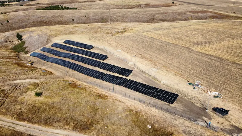Fenced solar park with access track