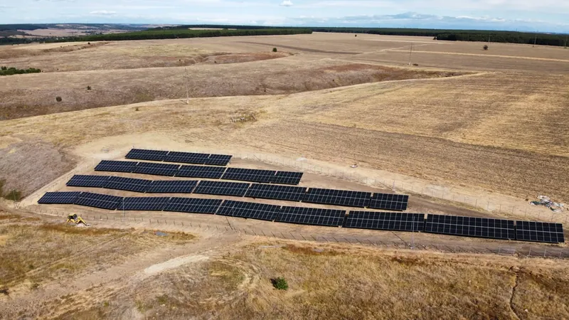 Wide aerial view of the solar park and surrounding farmland